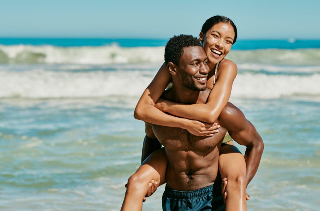 Happy couple on a romantic beach trip