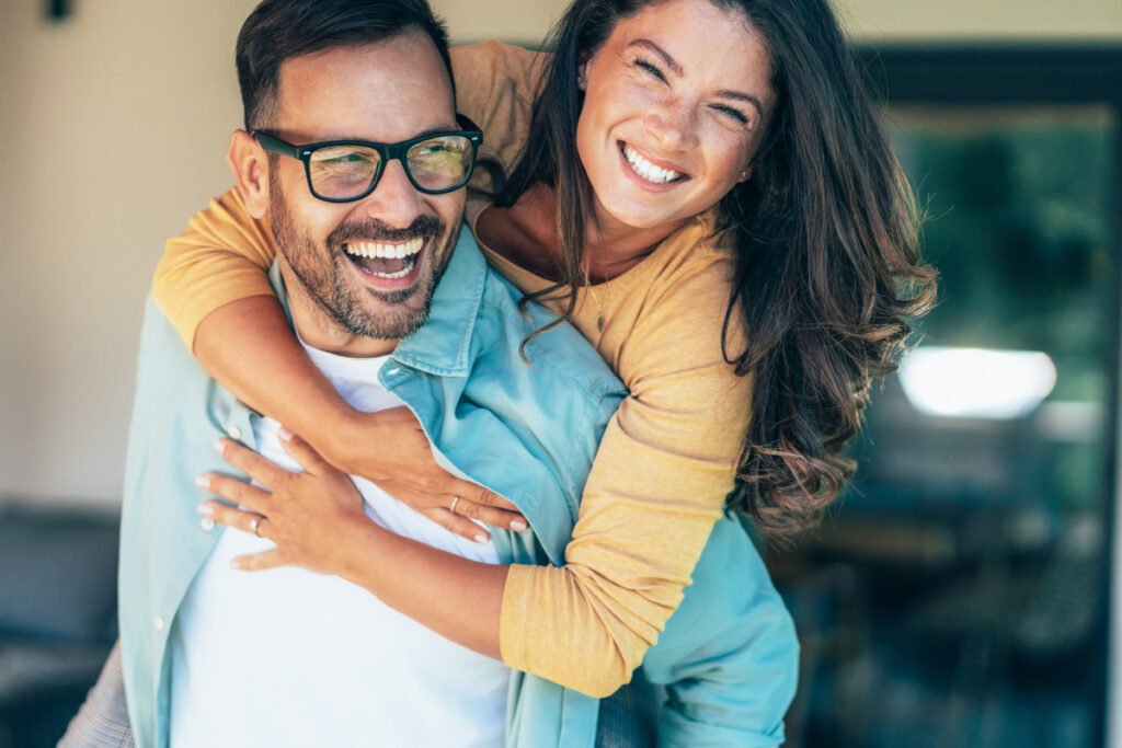 Man and woman feeling healthy and happy after hormone replacement therapy (HRT)