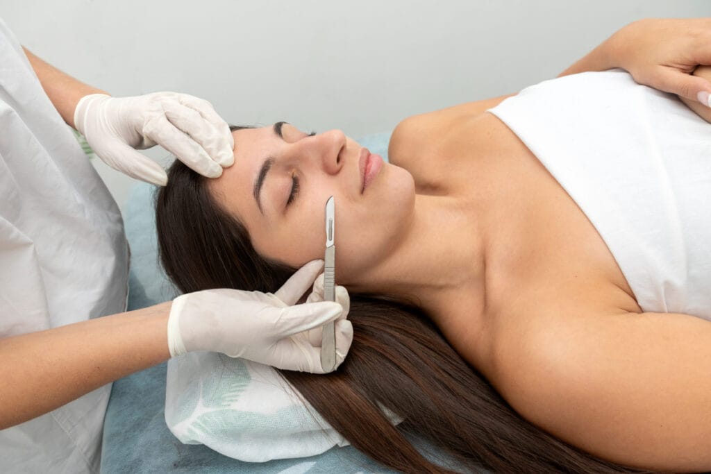 Woman getting a professional dermaplaning treatment at a medical spa